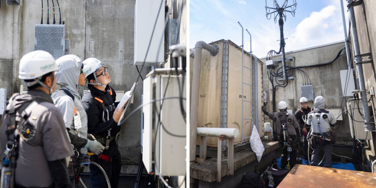 ビルの屋上で携帯基地局設備を確認する作業員たちと、制御盤の前で書類を広げて打ち合わせを行う様子